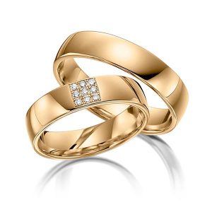 Couple d'alliances de mariage en or et pavage de diamants